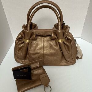 New Soprano Gold 100% Leather Handbag with makeup wallet and key chain.